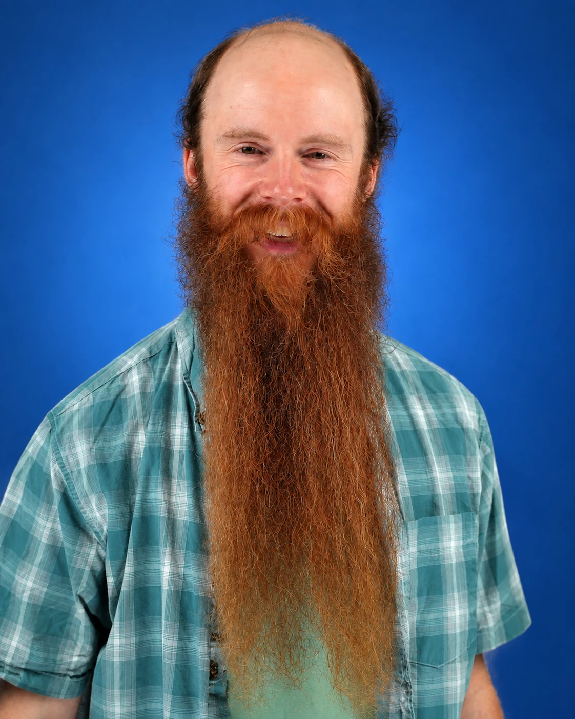 London Oliver in a blue plaid shirt