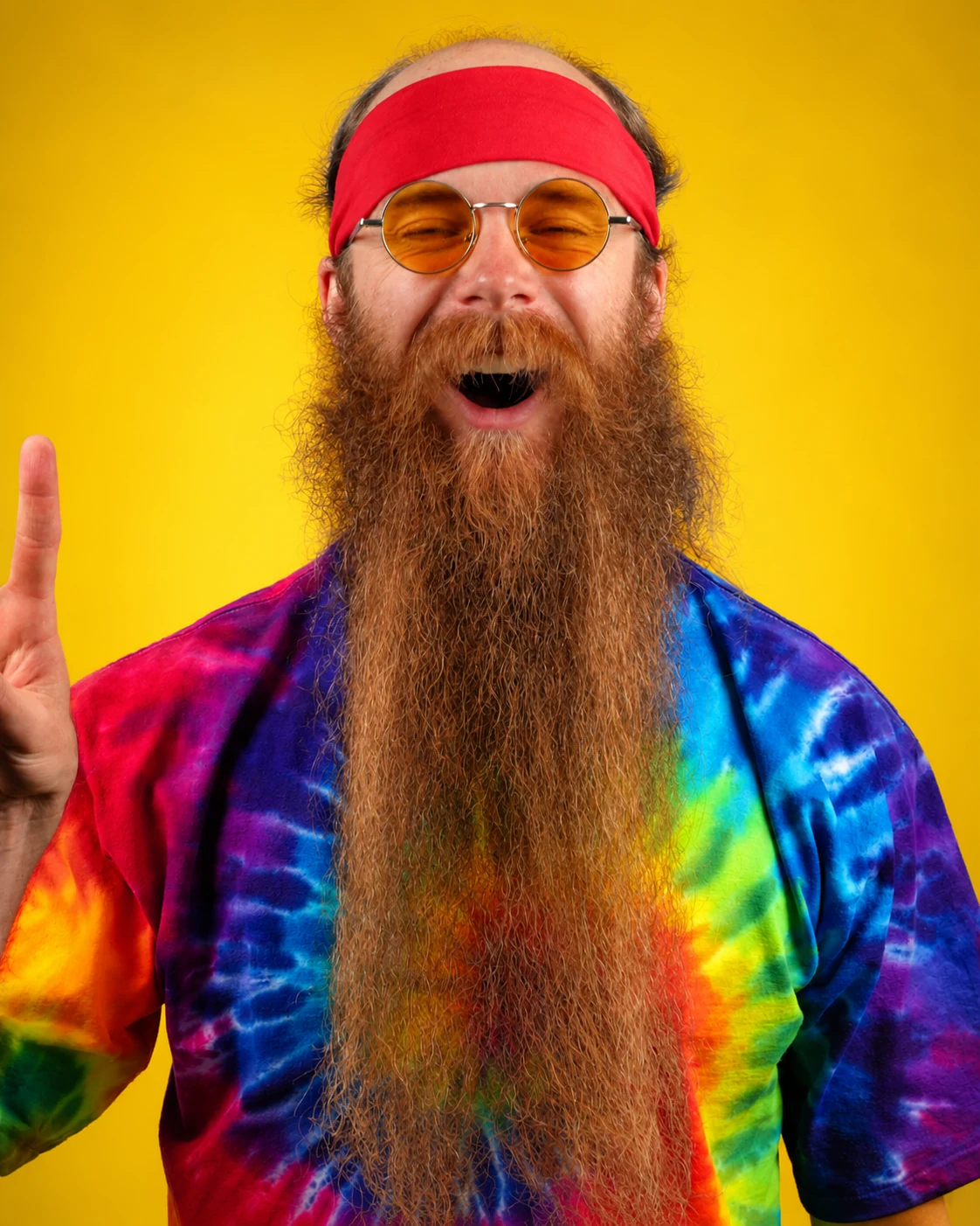London Oliver in tie-dye clothing and a red bandana
