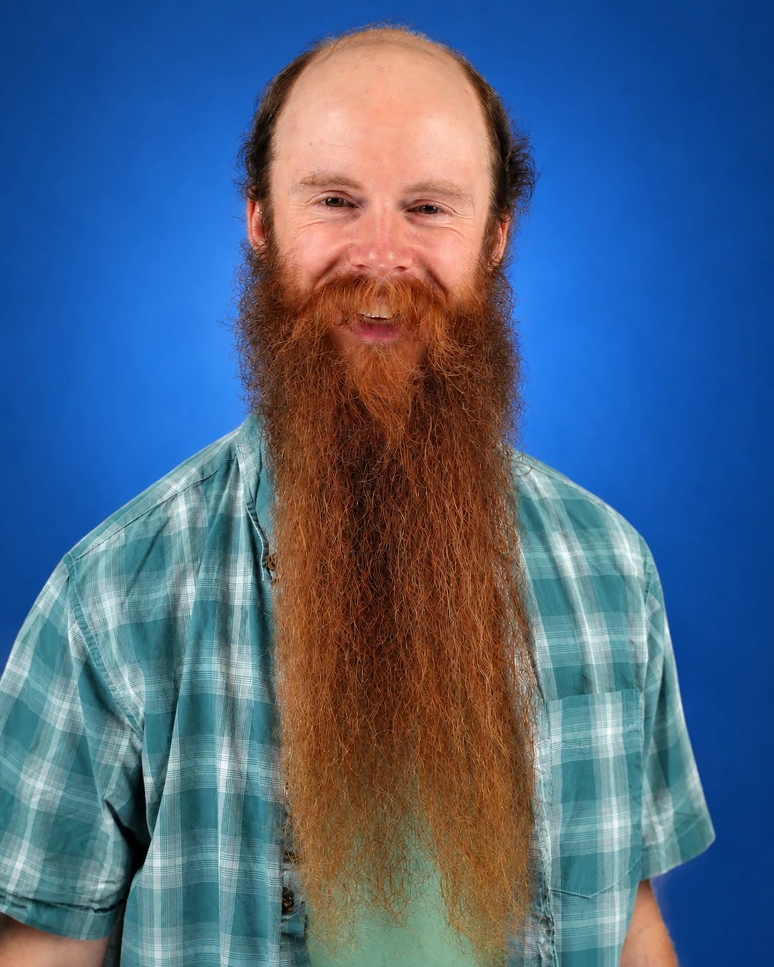 London Oliver in a blue plaid shirt