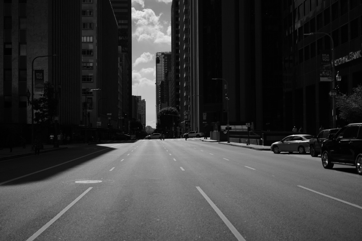 Sunlight cutting through a downtown Los Angeles street
